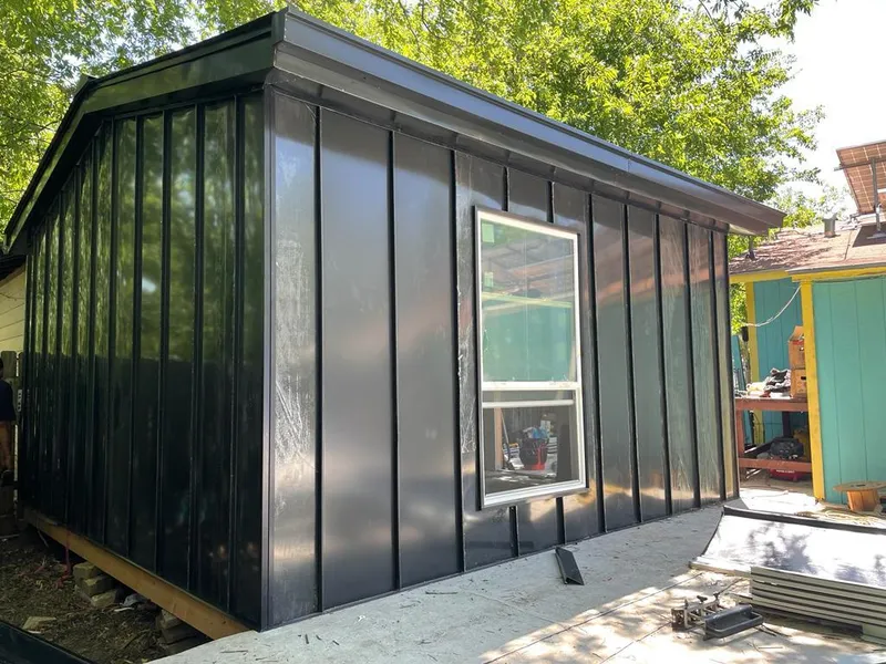 Black standing seam metal wall panels for Roof Inspection in Homestead Meadows South