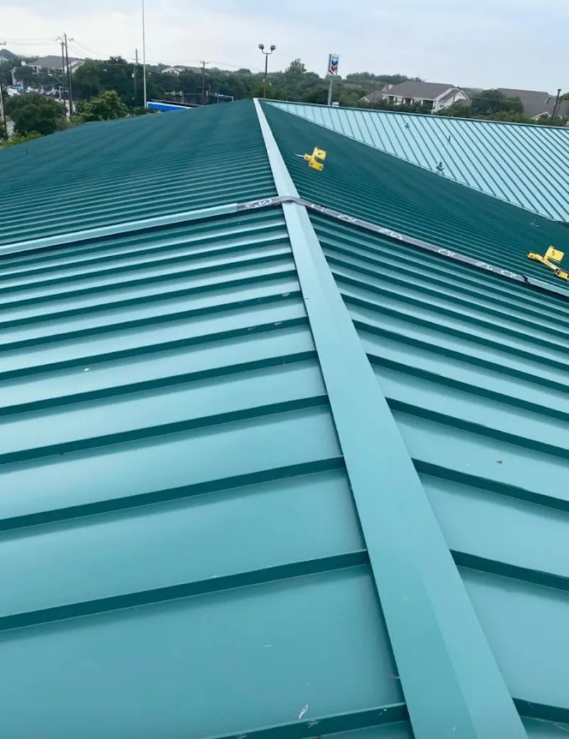 Green commercial metal roof ridge and valley for Metal Roof Repair in Homestead Meadows South